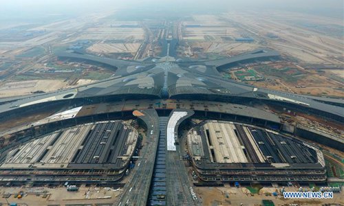 Aerial photo taken on April 28, 2018 shows a new Beijing airport under construction in Daxing District of Beijing, capital of China. China's civil aviation industry is accelerating its advance into the digital era, with major players sending clear signals of new opportunities worldwide.