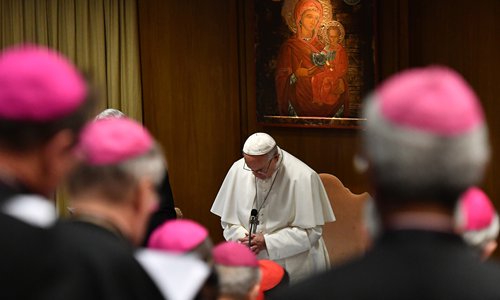 Pope Francis prays during the opening of a global child protection summit on the sex abuse crisis within the Catholic Church on Thursday at the Vatican. The pontiff has set aside three and a half days to convince Catholic bishops to tackle pedophilia in a bid to contain a scandal which hit an already beleaguered Church again in 2018, from Chile to Germany and the US (See story on Page 9). Photo: AFP
