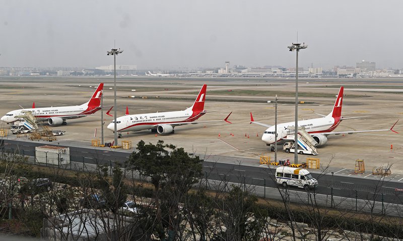 Three Boeing 737-8 aircraft park at the Shanghai Hongqiao International Airport on Monday. China's civil aviation authorities ordered the grounding of all commercial flights of the fleet after a deadly crash of the aircraft in Ethiopia that killed all 157 on board. Photo: VCG