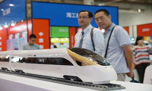 Participants look at a train model at a forum featuring patented technology and intellectual property rights protection in Dalian, Northeast China's Liaoning Province. File photo: IC