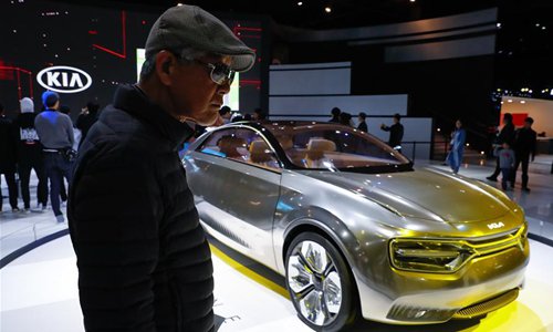 Visitors view a Kia's concept Imagine during the 2019 edition of Seoul Motor Show in Goyang, South Korea, April 2, 2019. (Photo: Xinhua)