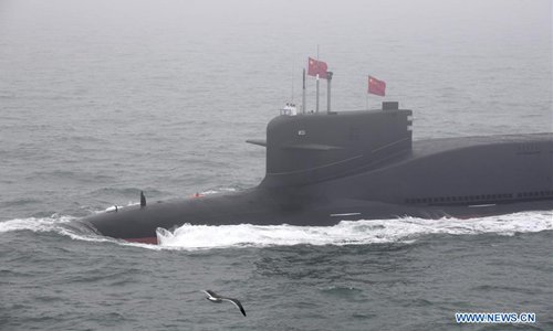 A new type of nuclear submarine of the Chinese People's Liberation Army (PLA) Navy is reviewed during a naval parade staged to mark the 70th founding anniversary of the PLA Navy on the sea off Qingdao, east China's Shandong Province, on April 23, 2019. (Photo: Xinhua)