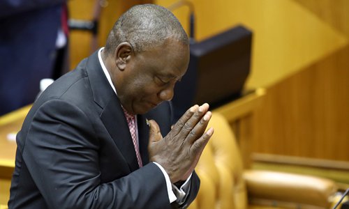 South African President Cyril Ramaphosa acknowledges the applause after Parliament elected him as president in Cape Town, South Africa on Wednesday. MPs from the African National Congress party, which won 230 out of 400 seats on May 8, choose the head of state in the parliament's first post-election sitting. Photo: VCG