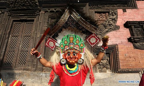 Mask dancers perform traditional "Bhairav Dance" in Bhaktapur, Nepal