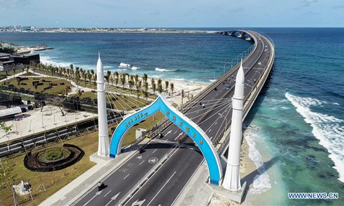 Aerial photo taken on Sept. 1, 2019 shows the China-Maldives Friendship Bridge in Maldives. The China-Maldives Friendship Bridge, the first cross-sea bridge in the Maldives built by a Chinese company connecting the Maldivian capital of Male with neighboring Hulhule Island, was inaugurated on Aug. 30, 2018 and put into use on Sept. 7, 2018. The 2-km-long bridge is an iconic project of the Maldives and China in co-building the 21st Century Maritime Silk Road. The bridge makes it possible for locals and tourists to travel between the two islands within five minutes. In one year, the bridge has brought great convenience for local people in their daily life. (Photo: Wang Mingliang/Xinhua)