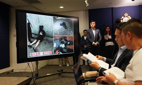 Officer injured in knife attack still in ICU: Hong Kong police - Global ...