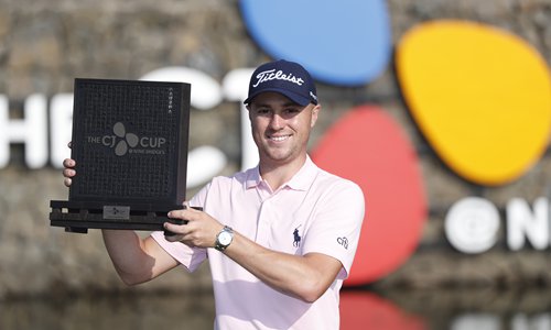 Justin Thomas of the USA holds up trophy after winning the CJ Cup at Nine Bridges PGA tour golf tournament at Nine Brid?ges Golf Club in Jeju, South Korea, 20 October 2019. Photo: IC