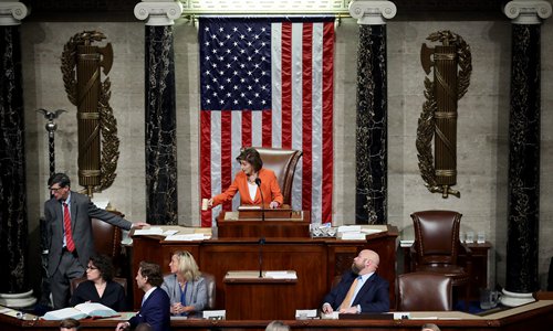 House Speaker Nancy Pelosi ends a vote by the US House of Representatives on a resolution formalizing the impeachment inquiry into US President Donald Trump Thursday in Washington, DC. Congress formally opened a new, public phase of its presidential investigation Thursday as US lawmakers voted for the first time to advance the impeachment process against Trump (See story on Page 2).  Photo: AFP
