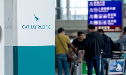 Cathay Pacific's logo seen in Hong Kong International Airport in March Photo: VCG