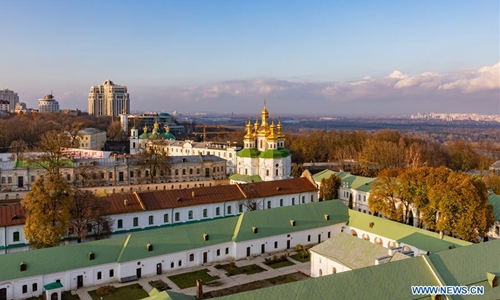 Photo taken on Nov. 11, 2019 shows the bell tower of the Monastery of the Caves in Kiev, Ukraine. The Monastery of the Caves (Pechersk Lavra) in Kiev was founded in the 11th century. It was included on the UNESCO World Heritage List along with Saint-Sophia Cathedral in 1990. Photo:Xinhua