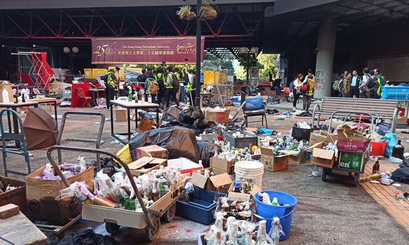 Hong Kong police and firefighters have entered the Hong Kong Polytechnic University on November 28 to search for dangerous chemicals. Photo: Yin Hao/GT