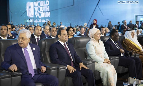 Egyptian President Abdel-Fattah al-Sisi (2nd L, Front) and Palestinian President Mahmoud Abbas (1st L, Front) attend the opening ceremony of the World Youth Forum in Sharm el-Sheikh, Egypt, on Dec. 14, 2019. Egyptian President Abdel-Fattah al-Sisi inaugurated on Saturday the third edition of Egypt's annual World Youth Forum (WYF) at the Red Sea resort city of Sharm el-Sheikh. (Xinhua/Li Binian)