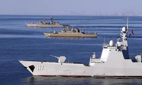 A photo made available by Iran Saturday shows the Chinese destroyer Xining (117), Iranian frigate Alborz (72) and Russian frigate Yaroslav Mudry sailing in the Indian Ocean and Gulf of Oman. Iran, China and Russia would have four days of joint drills, the commander of Iran's flotilla announced on Friday. Photo: AFP