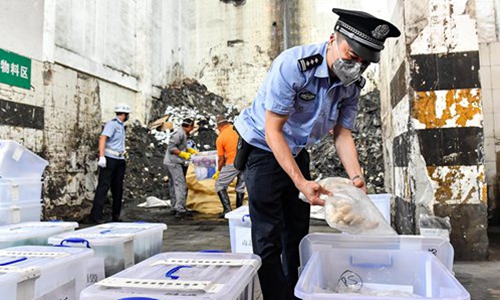 Police in Guangzhou, capital of South China's Guangdong Province destroy 312 kilograms of smuggled heroin, crack, methamphetamines and marijuana on Wednesday. Guangzhou police found the drugs by inspecting suspicious travelers, packages and cargos. Photo: IC