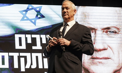 Benny Gantz, retired army general and leader of the Blue and White Israeli electoral alliance, attends an election rally in the central city of Rishon LeZion on Tuesday. Rocket fire from Gaza on Saturday night forced Gantz to take refuge with his team in a shelter, local media reported. Photo: AFP