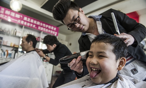 Salons gradually return to business in Beijing ahead of China's traditional  'haircut' holiday - Global Times
