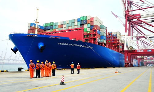 A COSCO ship at Qingdao Port in East China's Shandong Province on February 11 Photo: IC