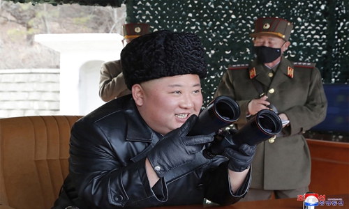 The photo taken on Monday and released by North Korea's official Korean Central News Agency on Tuesday shows North Korean leader Kim Jong-un inspecting the firepower strike drill ground of long-range artillery sub-units of the Korean People's Army at an undisclosed location (See story on Page 15). Photo: AFP