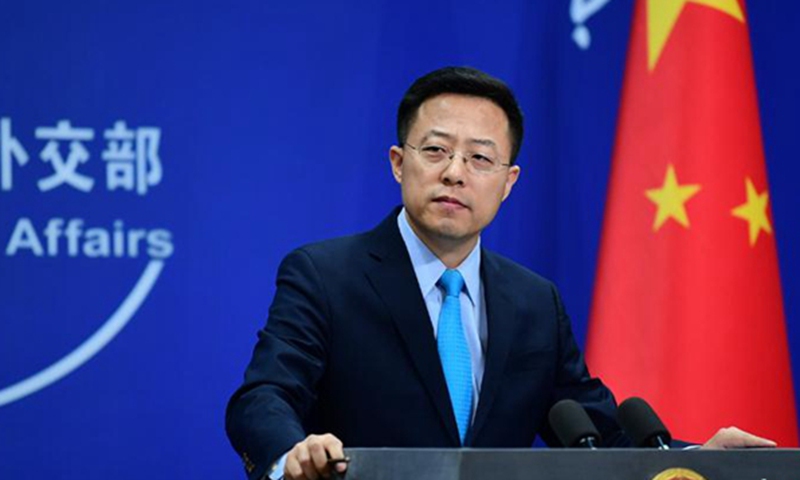 US should invite WHO experts to trace the origin of COVID-19 in their  country: Chinese FM - Global Times