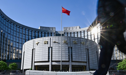 China's central bank on Monday cut benchmark lending rates by the steepest margin since August 2019 when the market-oriented loan prime rate regime was adopted. The nation is striving to repair the damage of the coronavirus outbreak,which caused GDP to contract in the first quarter. Photo:cnsphoto