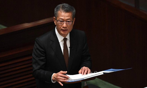 Financial Secretary for the Hong Kong Special Administrative Region Paul Chan Mo-po gives a speech on the 2020-21 budget of Hong Kong in the Legislative Council on February 26. (Photo: HKSAR government)