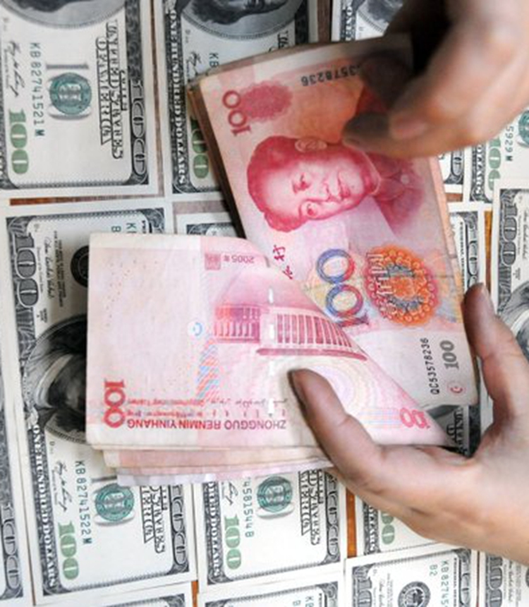 dollar yuan Photo:Xinhua
