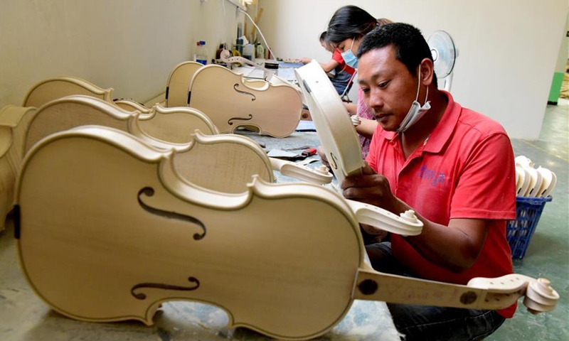 Local authorities in Henan develop musical instrument producing ...