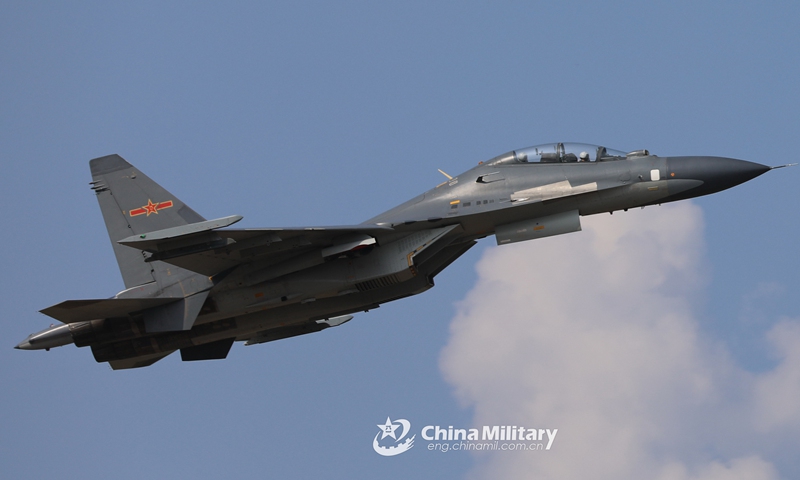 A Su-30 fighter jet attached to an aviation brigade of the air force under the PLA Southern Theater Command soars into the sky during a flight training exercise on October 10, 2019. (eng.chinamil.com.cn/Photo by Lyu Shiqiang)