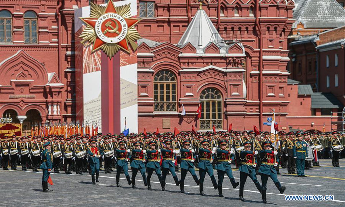 Russian national honour guard soldiers march during the military parade marking the 75th anniversary of the victory in the Great Patriotic War on Red Square in Moscow, Russia, on Wednesday. Photo: Xinhua