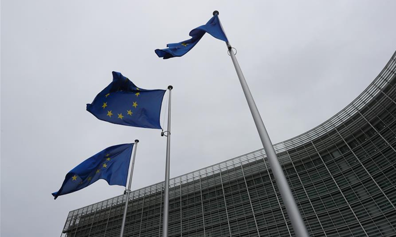 Flags of the EU fly in front of the headquarters of the European Commission in Brussels, Belgium, June 30, 2020. The Council of the European Union (EU) on Tuesday adopted a recommendation to lift entry restrictions for residents of some third countries starting Wednesday, and the United States is noticeably shut out. (Xinhua/Zheng Huansong)