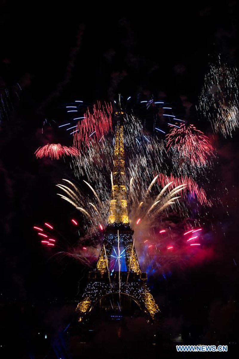 Fireworks light up sky over Eiffel Tower to celebrate Bastille Day
