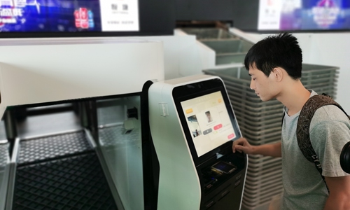 A passenger is using One ID facial recognition service at the Guangzhou Baiyun International Airport on August 5, 2020. Photo: Courtesy of the Guangzhou Baiyun International Airport