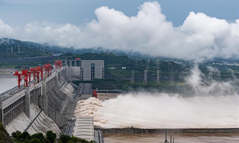 Aerial photo taken on Aug. 20, 2020 shows floodwater gushing out from the Three Gorges Dam in central China's Hubei Province. The Three Gorges Reservoir is undergoing the test of a record high inbound water flow on Wednesday since the reservoir was constructed in 2003. The inbound flow reached 75,000 cubic meters per second around 8 a.m. as the peak floodwater of Yangtze River's fifth flood of the year arrived at the dam. Photo:Xinhua