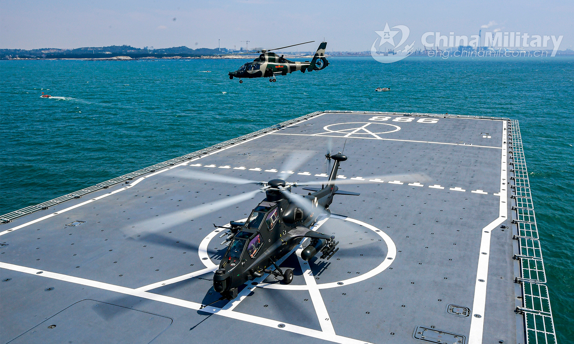 A Z-9 attack helicopter and a WZ-10 attack helicopter assigned to an army aviation brigade under the PLA 73rd Group Army lift off from the flight deck of the dock landing ship Yimengshan (Hull 988) successively during an inter-Services maritime coordinated training exercise with the PLA Navy at an undisclosed sea area on August 3, 2020. (eng.chinamil.com.cn/Photo by Li Shilong)