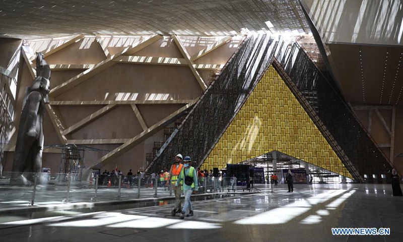 Workers are seen at the construction site of the Grand Egyptian Museum in Giza, Egypt, on Aug. 25, 2020. Egypt has received 126,000 tourists since it reopened its seaside resorts to international flights and foreign tourists on July 1, after a three-month halt due to the coronavirus pandemic, Egyptian Minister of Tourism and Antiquities, Khaled al-Anany, said on Aug. 24. (Xinhua/Ahmed Gomaa)