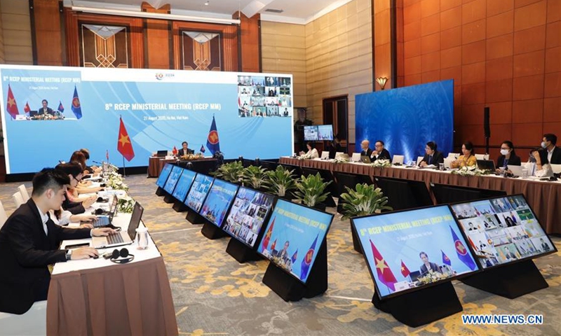 People attend the eighth Regional Comprehensive Economic Partnership (RCEP) Ministerial Meeting via video conference in Hanoi, Vietnam on Aug. 27, 2020. Economic ministers of the 10 Association of Southeast Asian Nations (ASEAN) members and from China, Japan, South Korea, Australia, and New Zealand on Thursday underscored the significance of the RCEP in post-COVID-19 pandemic recovery. (VNA via Xinhua)