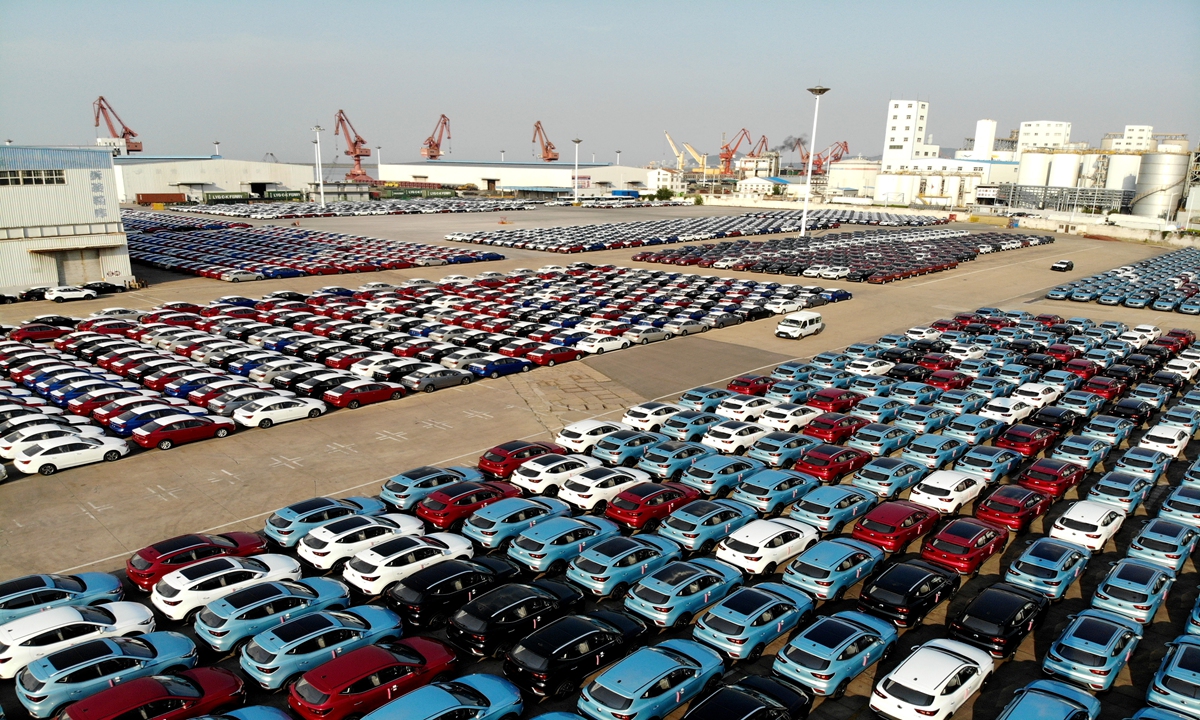 Nearly 5,000 of SAIC's MG-branded vehicles wait to be exported at the port of Lianyungang, East China's Jiangsu Province on Sunday. The vehicles are headed to markets including the UK, Australia and Belgium. The port's auto export business has grown rapidly this year. Photo: cnsphoto