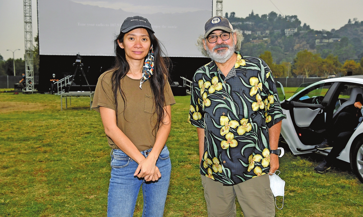 Chinese director Chloe Zhao  and Fox Searchlight Co-Chairman Stephen Gilula attend the drive-in premiere of her film Nomadland on Friday in Pasadena, California. Photo: AFP