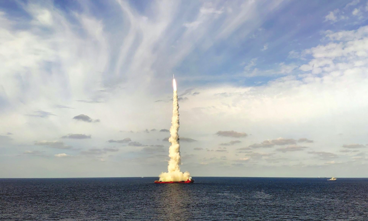 A Long March-11 solid-propellant light launch vehicle lifts off from a mobile floating platform in the Yellow Sea off the coast of East China's Shandong Province on Tuesday. Photo: VCG
