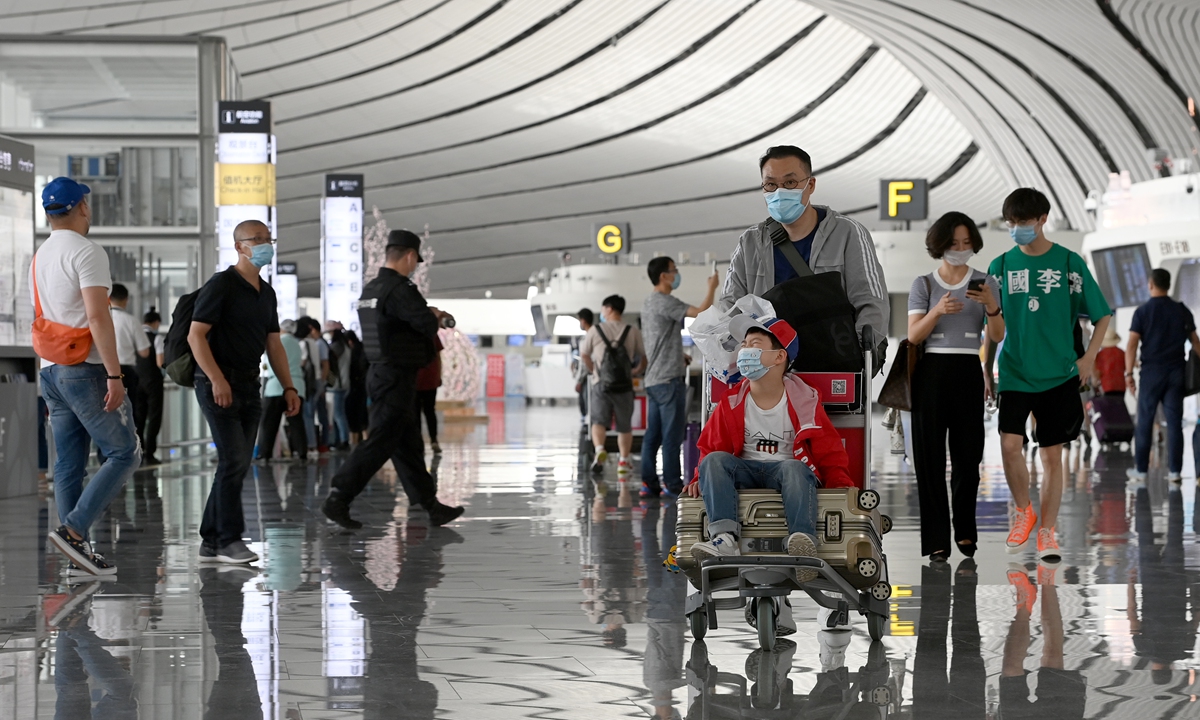 Passengers seen at the Beijing Daxing International Airport on June 3 Photo: cnsphoto