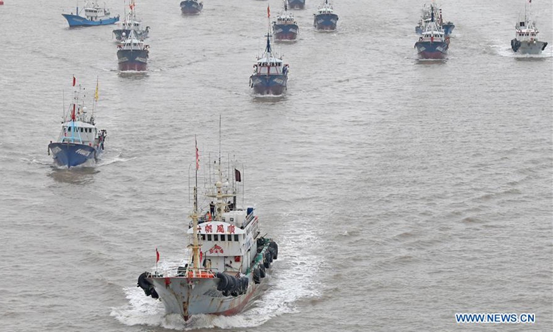 Fishing boats depart from the Shenjiamen Port in Zhoushan, east China's Zhejiang Province, Sept. 16, 2020. Fishing boats departed from ports in Zhejiang Province at noon on Wednesday, marking the end of the four-and-a-half month summer fishing ban in the East China Sea. (Photo by Chen Yongjian/Xinhua)