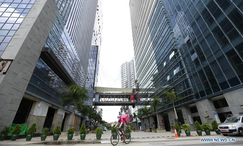 A closed shopping mall at a condominium complex is seen in Yangon, Myanmar, Sept. 26, 2020. The number of COVID-19 infection cases in Myanmar reached 9,991 on Saturday night, said a release from the Health and Sports Ministry. According to the release, Myanmar reported 880 new confirmed cases and 24 more deaths on Saturday night. (Xinhua/U Aung)