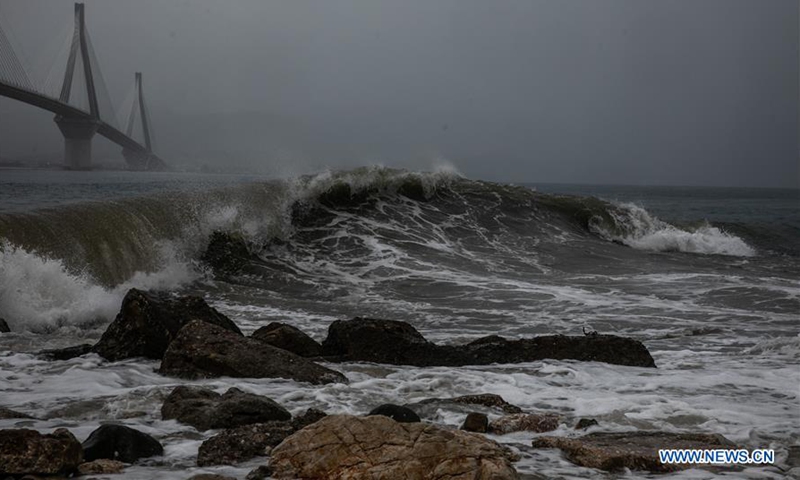 Storm-triggered waves approach town of Rio in suburbs of Patras, Greece ...