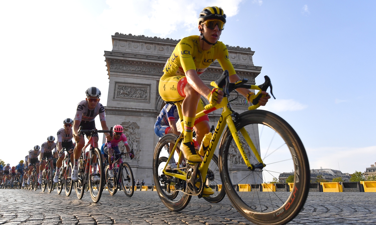 Tadej Pogacar rides during the final stage of the 2020 Tour de France on Sunday. Photo: VCG