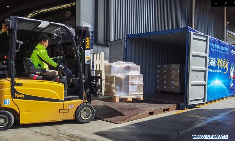 A worker forklifts New Zealand products into a container to be shipped to China for the third China International Import Expo 2020 (CIIE), in Auckland, New Zealand, Sept. 18, 2020. A shipping container loaded with premium products of New Zealand has embarked from the Ports of Auckland at mid-night Thursday for the third China International Import Expo 2020 (CIIE) to be hosted by Shanghai between Nov. 5 and Nov. 10. The container, on board the China - New Zealand Service by COSCO SHIPPING Lines, affiliated with China COSCO Shipping Corporation Limited, is expected to arrive at Shanghai Port in mid-October. (Xinhua)