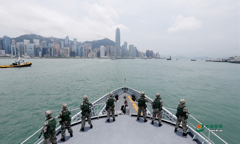 The Hong Kong Garrison of the Chinese People's Liberation Army (PLA) holds a drill in waters near Hong Kong, June 26, 2019. Members of the army, navy and air force of the PLA garrison in Hong Kong took part in the joint naval and air patrol exercise that aimed to review and raise the units' combat abilities in emergency dispatches, ad hoc deployment and joint operations. (Photo: 81.cn)