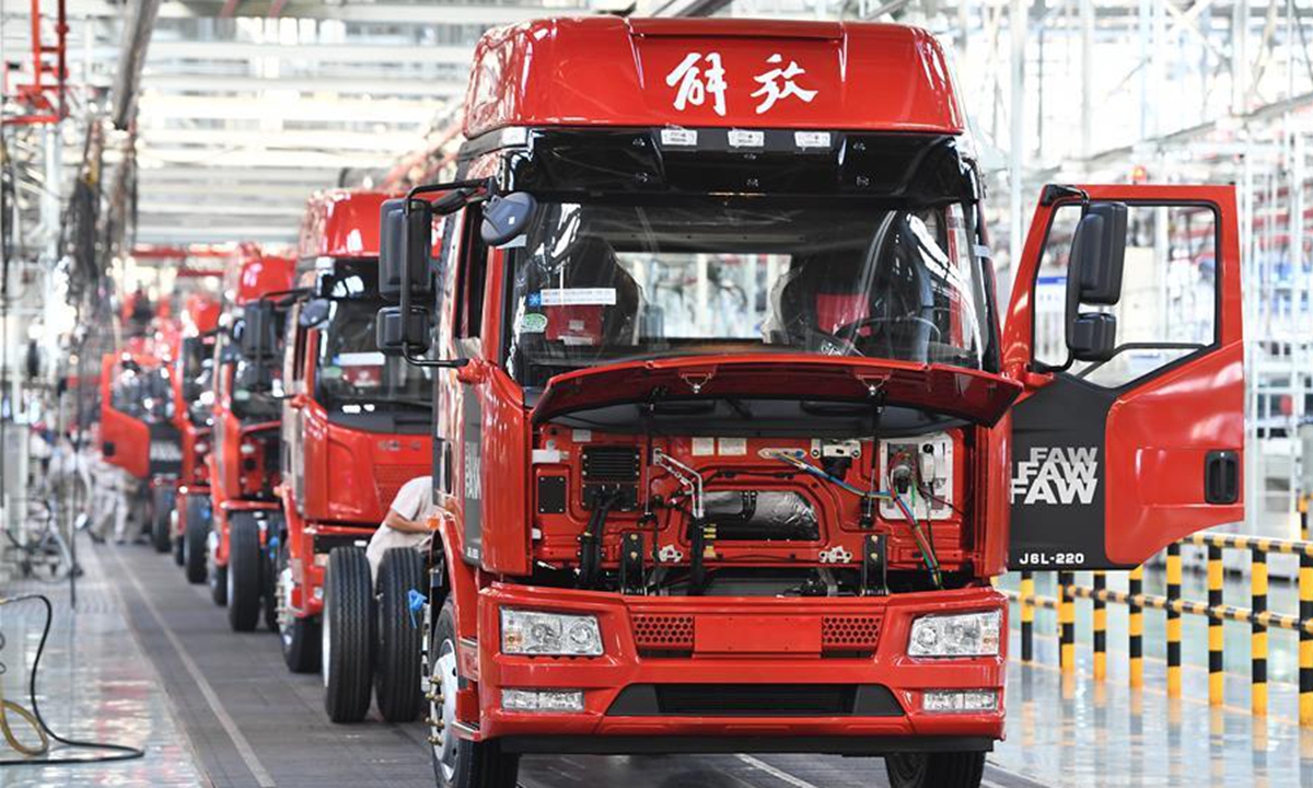 Vehicles wait for assembling at a factory of the First Automotive Works (FAW) Group Co., Ltd. in Changchun, capital of northeast China's Jilin Province, Sept. 23, 2020. China's leading automaker First Automotive Works (FAW) Group Co., Ltd. sold 2,656,744 vehicles in the first three quarters of the year, up 8 percent year on year, according to corporate sources. (Xinhua/Zhang Nan)