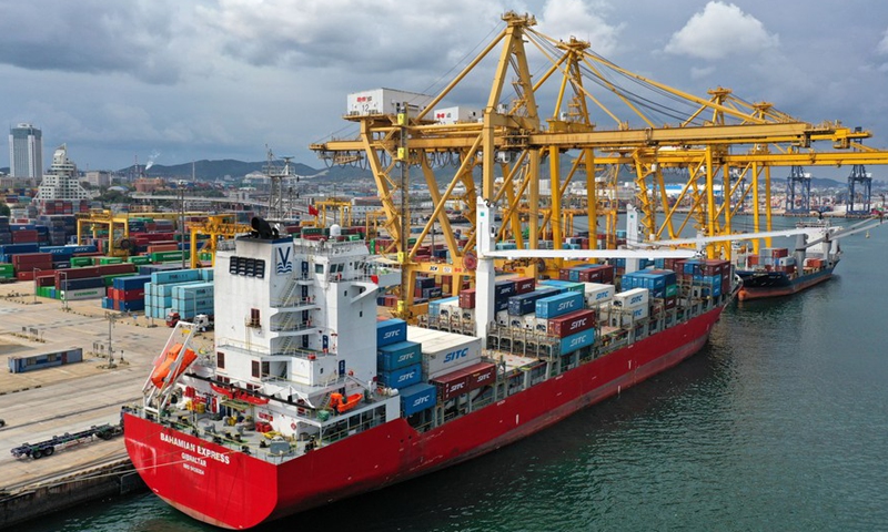 Aerial photo taken on Sept. 24, 2020 shows a cargo ship loaded with containers at Dalian port in northeast China's Liaoning Province.Photo:Xinhua