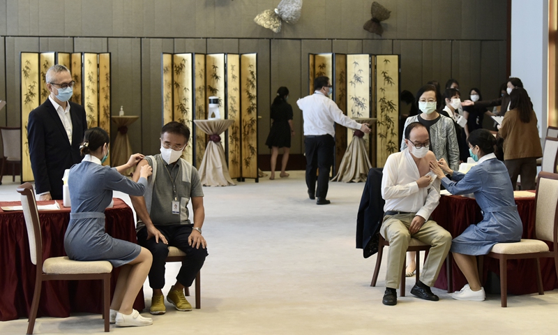 Members of the Legislative Council of the Hong Kong Special Administrative Region (HKSAR) get their seasonal influenza vaccinations on Wednesday. The HKSAR government has reminded citizens to get vaccinated as soon as possible and to take personal health precautions. Photo: CNS Photo