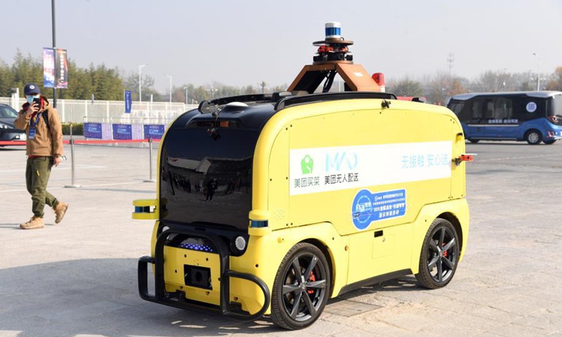 Photo taken on Nov. 12, 2020 shows an unmanned delivery car displayed at the 2020 World Intelligent Connected Vehicles Conference held in Beijing, capital of China. The three-day conference kicked off here on Wednesday. (Xinhua/Ren Chao)

